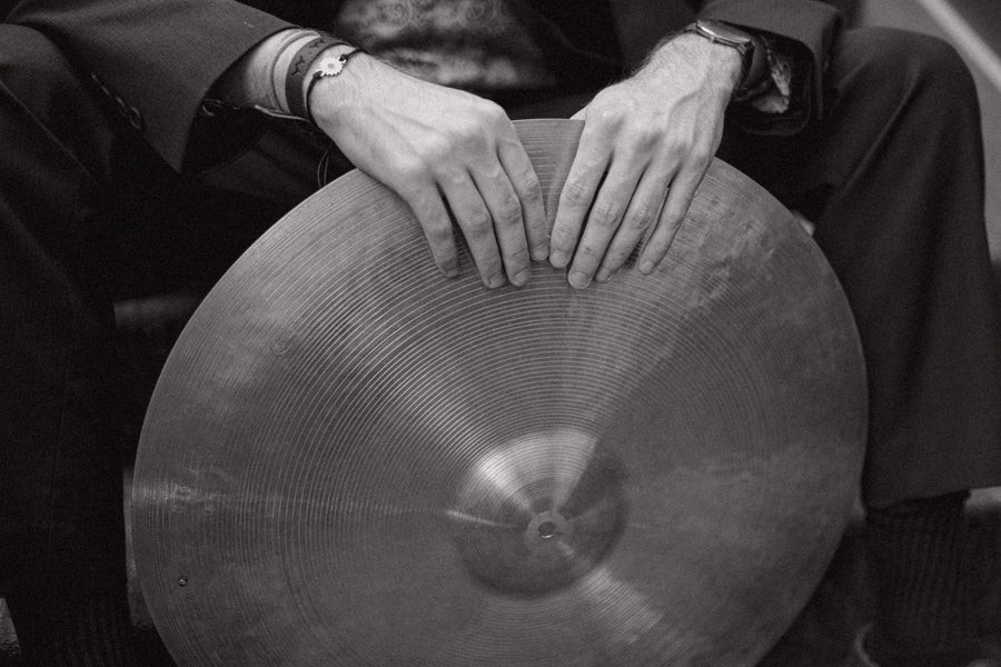 Close-up of a ride cymbal in Ryan Barski's drum studio, black and white