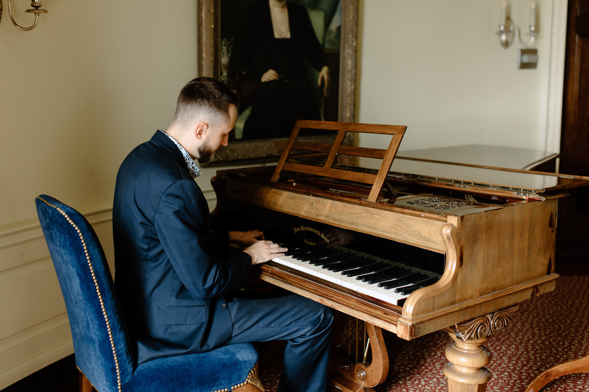 Ryan Barski at the piano during a piano lesson, Rochester NY